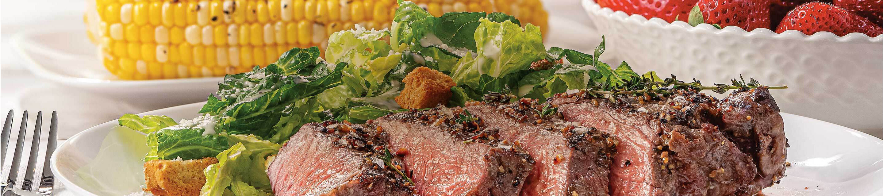Grilled strip steak meal